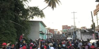 A migrant caravan gets ready to head north from Tapachula, Chiapas, in November 2021.