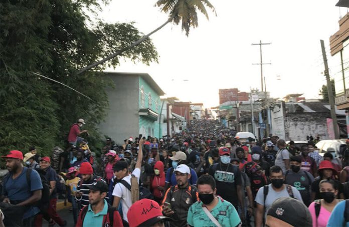 A migrant caravan gets ready to head north from Tapachula, Chiapas, in November 2021.