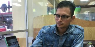 Joel Rondón shows a video of an attack against him in Chile.