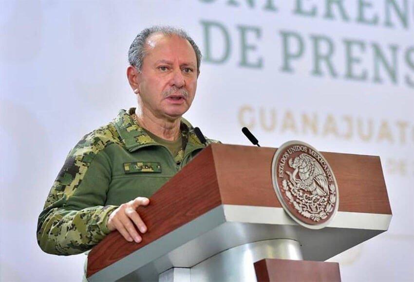 Navy Minister José Rafael Ojeda speaks at the president's Friday morning press conference.