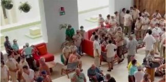 Tourists gather inside a Puerto Morelos hotel