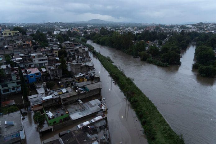 An aerial view of the overflowing Tula River.