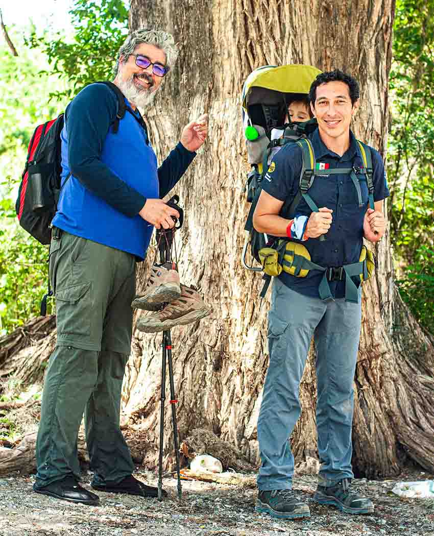 Alejandro Gonzalez hiking with a baby