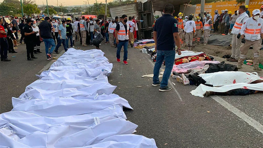 Bodies of the victims lined up on the Chiapas highway.