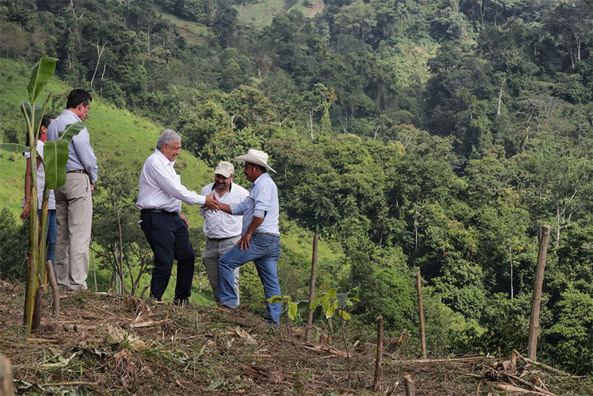 The president visits with Sembrando Vida program participants in Chiapas in 2019. He has touted the Sembrando Vida program as an example of an environmentally friendly government program.