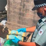 A National Guardsman with confiscated bags of fentanyl.