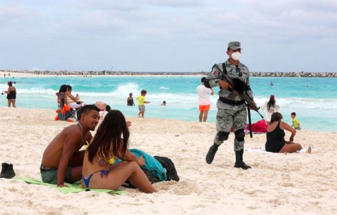 A National Guardsman on patrol on a Quintana Roo beach.