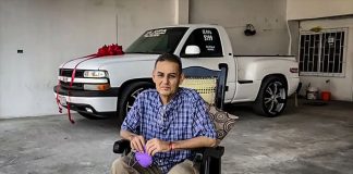 Juan Manuel Vidales with the Chevrolet pickup he raffled to raise money for his cancer treatment.