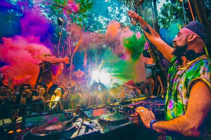 Festival-goers gather around a DJ at the Day Zero Festival in Tulum earlier this month.