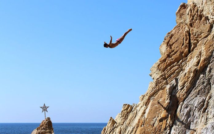 One of Acapulco's divers takes the 30-meter plunge.