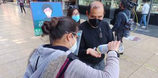 A driver who broke the rules dispenses gel in Mexico City.