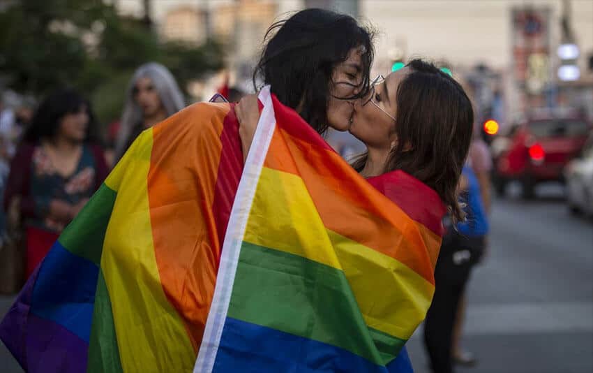 A Tijuana couple celebrates after same-sex marriage was approved in Baja California in 2021. The HRW cited sexual and gender identity rights as one bright spot in Mexico's recent human rights record.