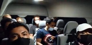 Travelers in one of the vans detained Tuesday evening filmed a bilingual video pleading for help from the government.