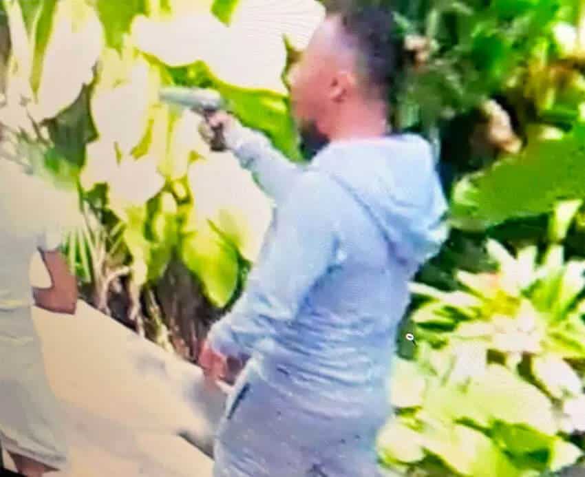 The suspected gunman in the Xcaret hotel shooting was caught on camera wielding a gun, but authorities have yet to make an arrest.
