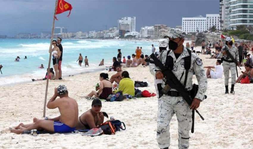Soldier on beaches of Cancun