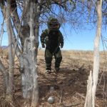 soldier seeking out land mines Michoacan
