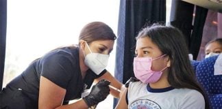 A shot is given to a girl