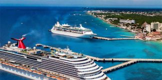 Two cruise ships dock in Cozumel, in 2019.