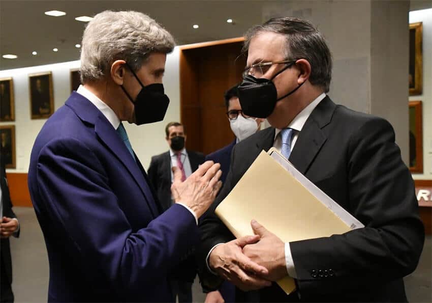 Foreign Minister Marcelo Ebrard and U.S. climate envoy John Kerry in conversation on Wednesday.