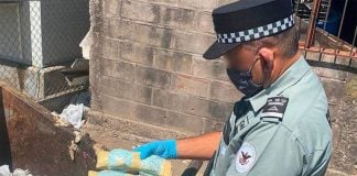 A National Guard agent with bags of confiscated fentanyl.