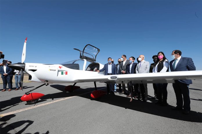 Guanajuato Governor Diego Sinhue along with political and business leaders gather around a prototype Halcón 2.