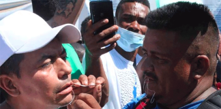 Migrants performed the lip-sewing operation on each other