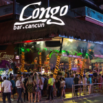 Spring break visitors at a bar in Cancún.