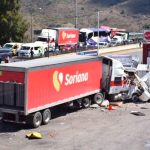 The runaway truck was brought to a halt when it collided with a food stand.