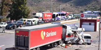 The runaway truck was brought to a halt when it collided with a food stand.