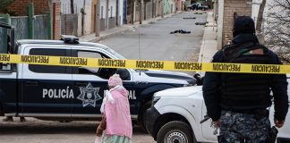 Ten bodies wrapped in blankets and tape were found on a street in Fresnillo on Saturday.