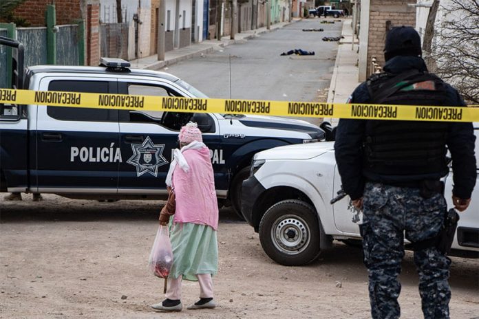 Ten bodies wrapped in blankets and tape were found on a street in Fresnillo on Saturday.