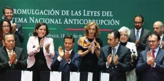 President Peña Nieto and other officials celebrate a new anti-corruption system in 2016.