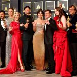 Eugenio Derbez (second from left) poses with fellow CODA cast members after winning the Oscar.