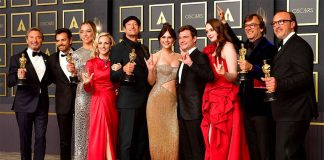 Eugenio Derbez (second from left) poses with fellow CODA cast members after winning the Oscar.