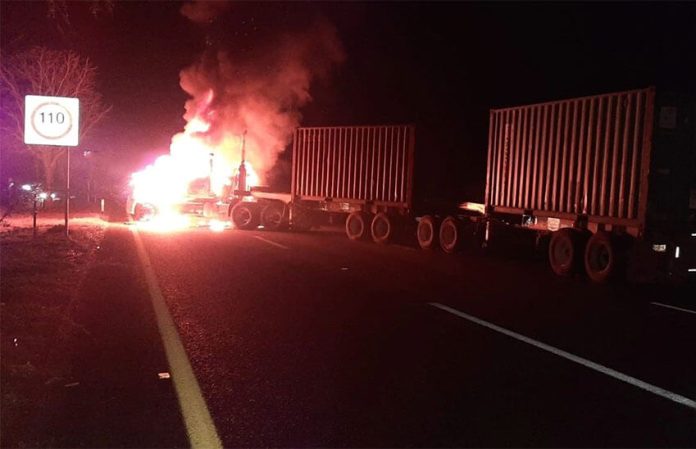 Burning vehicles blocked Colima highways in at least four places Sunday night and Monday morning.