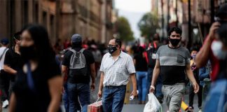 Two states have dropped outdoor face mask mandates, and others are considering changes.