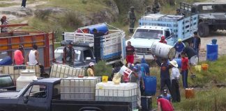 Fuel thieves at a pipeline tap.