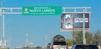 A sign reading "Bienvenido a Nuevo Laredo" on a Tamaulipas highway