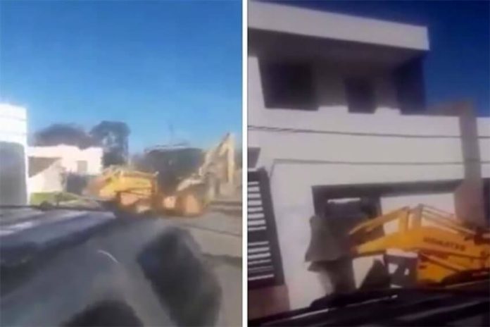 Two homes in Pitiquito were attacked with backhoes while presumed cartel members filmed, taunting their enemies.