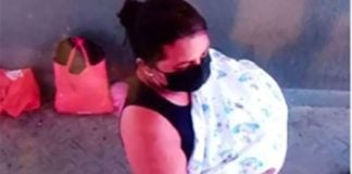 A surveillance camera captured a woman making off with the baby