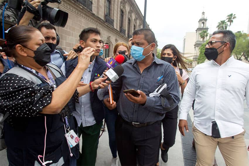 Mario Escobar talks with reporters after a meeting with Nuevo León Governor Samuel García on Friday.