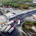 Truckers blocked the Pharr-Reynosa International Bridge on Monday to protest Texas' slow, thorough new inspection policy.