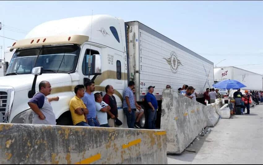 Mexican truckers briefly protested the onerous Texas border policy by blocking the Pharr-Reynosa International Bridge.