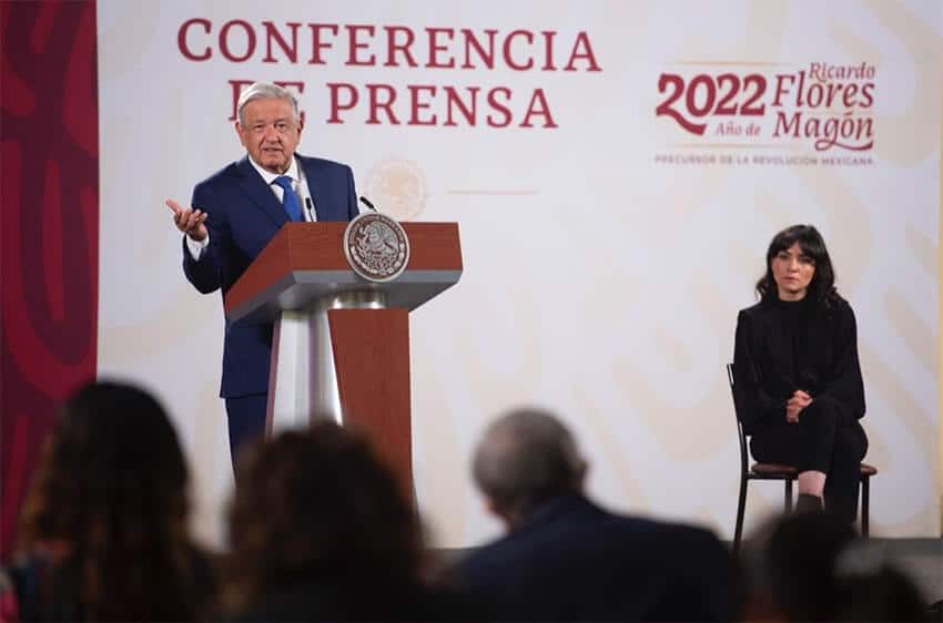 AMLO speaks as Ana García Vilchis waits to present her section.