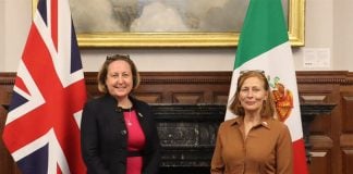 U.K. International Trade Secretary Anne-Marie Trevelyan, left, poses with Economy Minister Tatiana Clouthier, right.