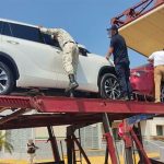 The six Honduran immigrants were found inside new cars