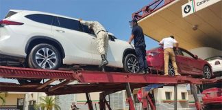 The six Honduran immigrants were found inside new cars