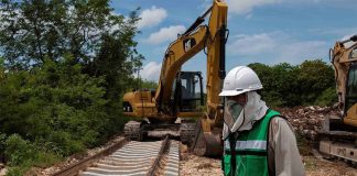 A construction crew works on a section of the Maya Train in Yucatán.