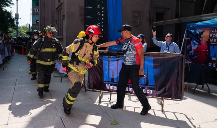 Firefighters begin their race at the Torre Reforma on Saturday.
