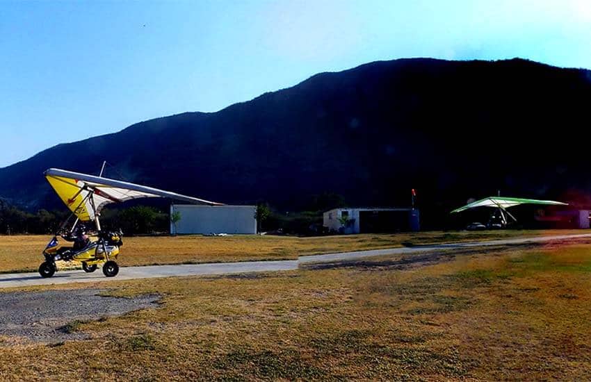 trike pulling hang glider at Kordich Air Sports, Jalisco